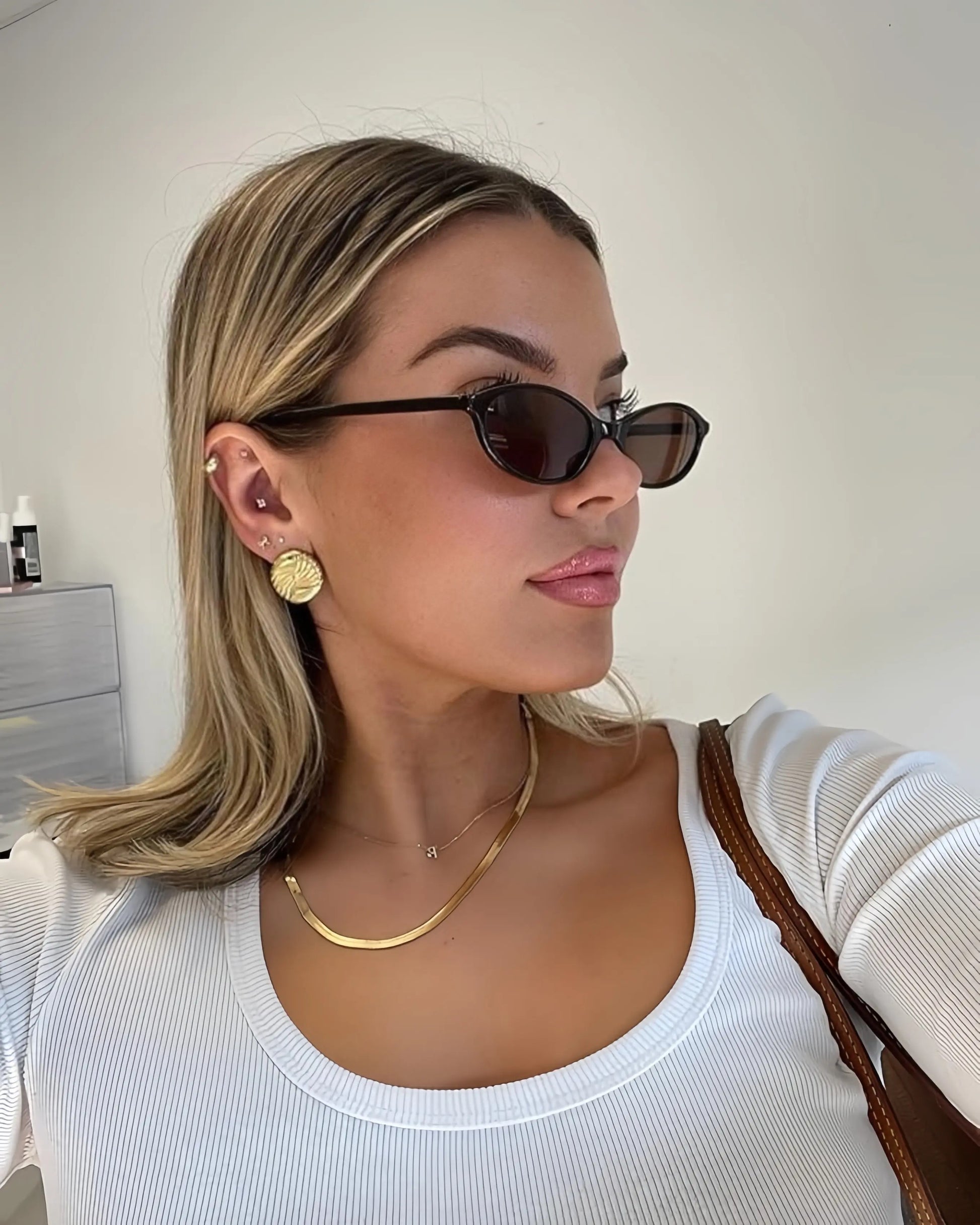 Retro oval sunglasses lifestyle product photo